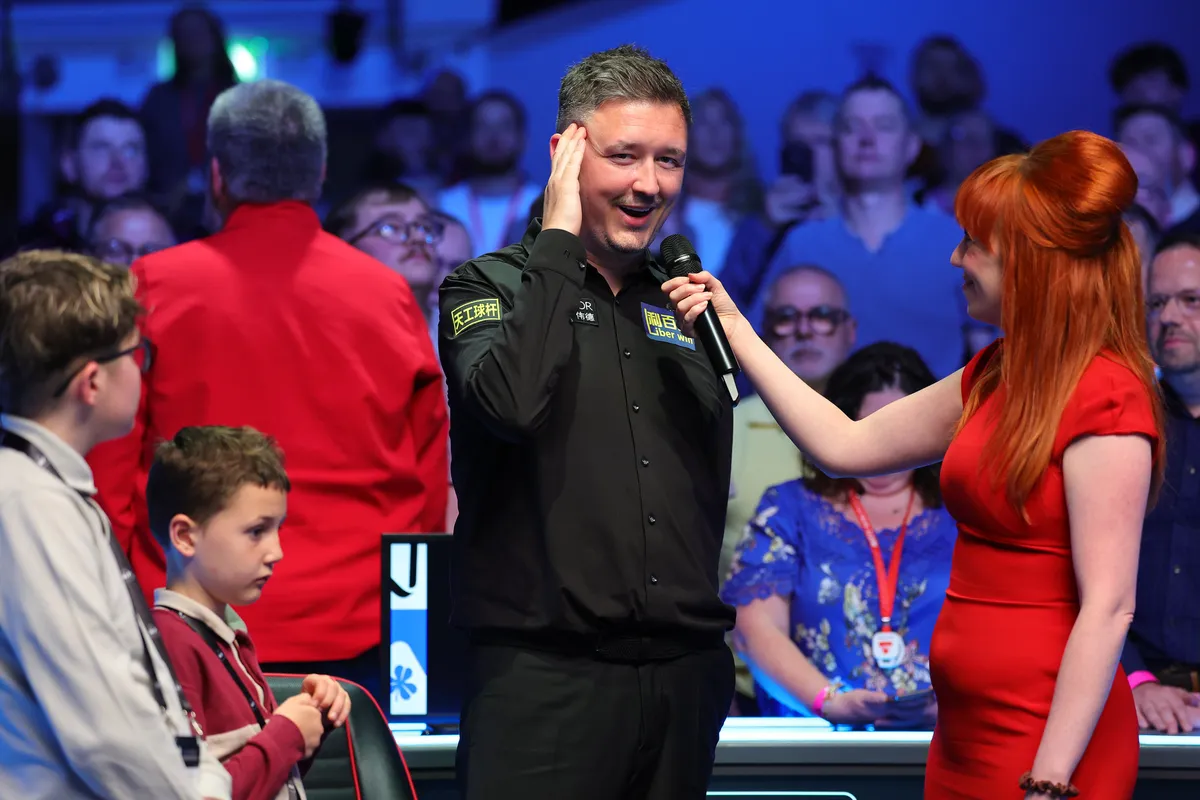 Kyren Wilson and Jak Jones shake hands after the final