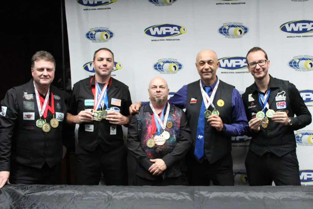 The 2026 Artistic Pool discipline medal winners pose after the Book Event