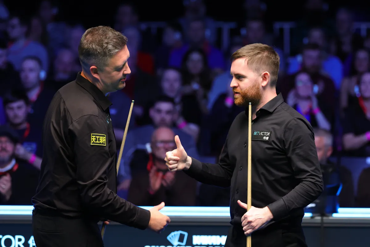 Wilson acknowledges the Belfast crowd after sealing the title