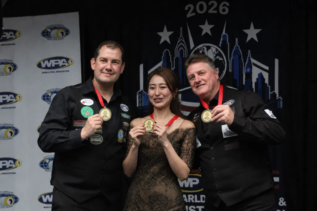 Wayne Parker, Kaori Ebe and Wayne Smith display the Freestyle signature awards